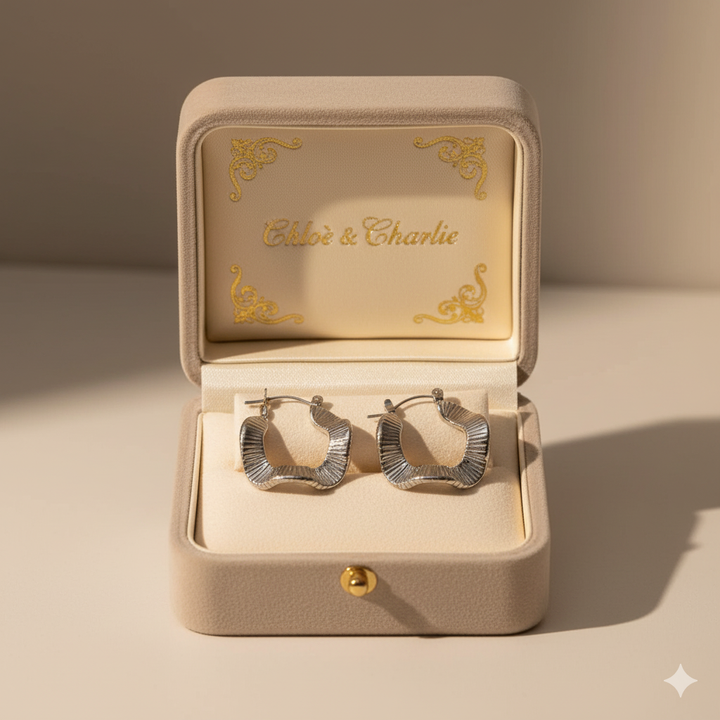 Geometrische Wellen Silber Creolen